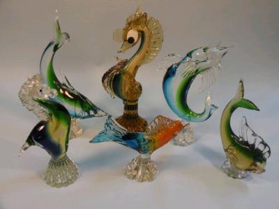 Four Murano glass fish and two sea otters