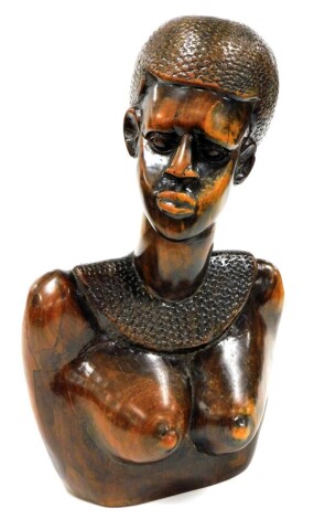 Tribal Art. A carved wooden bust of a nude lady, 38cm high.