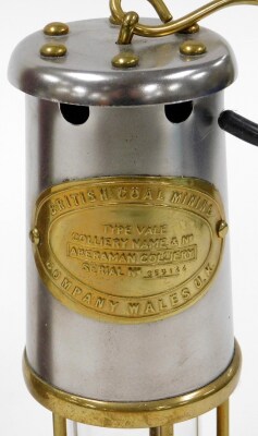 A Welsh miners lamp, with modern fitments, in presentation tube, for The British Coal Mining Company Wales UK, serial number 359144, 21cm high. - 2