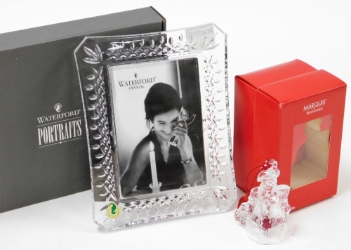 A group of Waterford crystal, to include Marquis by Waterford snowman Christmas figure, boxed, and a Waterford crystal portrait collection photograph frame, boxed, with protective sleeve, 22cm x 16.5cm. (2)