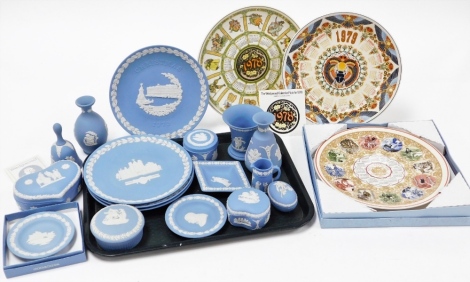 A group of Wedgwood blue Jasperware and collectors plate, to include three year calendar plates for 1979, 1978, and Millennium 1999 literature, with one box, together with a selection of Wedgwood Jasperware, to include Christmas plates, trinket boxes, vas