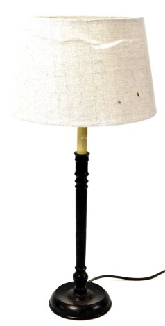 A modern metal finish table lamp, on column supports with cream shade, 65cm high.