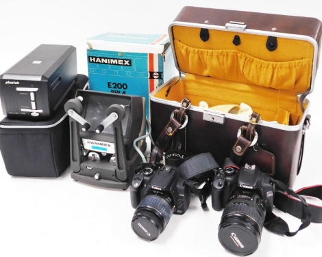 A group of cameras and equipment, to include an E200 movie editor Dual3, a Plus Tech optic film 7500, and a leather camera carry case with a Canon EOS50D, with Canon zoom lens 28-13mm, and a Canon EOS 350D with Canon lens 18-55mm. (a quantity)