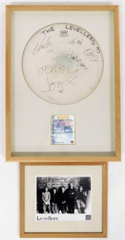 The Levellers signed drum skin framed for 97 with Heroes, framed, certificate of authenticity, and a China Recoreds Levellers photograph with signed letter from AL Frasier to reverse dated 2016. (2)