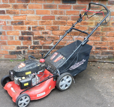 A 20" Frisky Fox Plus lawn mower, with quadcast four blade, 5.5hp, with instruction book.