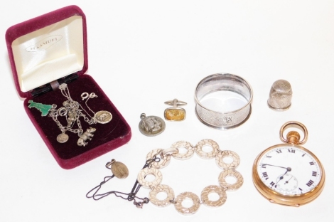 A group of jewellery, to include a star Dennison gold plated pocket watch, silver napkin ring and thimble, silver plated coin jewellery, etc.