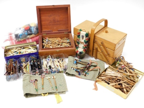 A collection lace bobbins, wooden examples and ivorine examples, sewing boxes, darns, etc. (1 box)