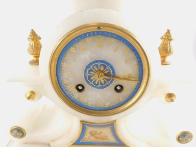 A late 19thC continental alabaster mantel clock, with an urn shaped two handled crest, the dial with blue lapis coloured border, above part painted panels decorated with a female mask and a putto, on a gilt plinth, 37cm high overall 30cm wide. - 2