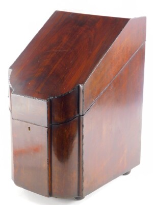 A George III mahogany and ebony strung slope top knife box, the hinged lid enclosing a later fitted interior, on bun feet, 43.5cm high, 24cm wide.