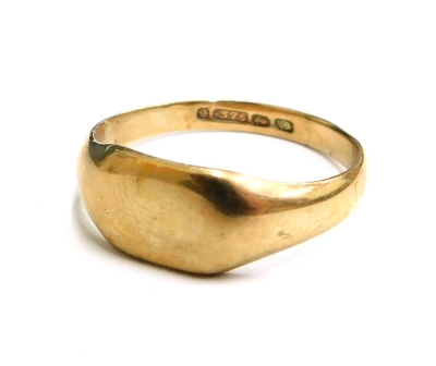 A 9ct gold signet ring, with elongated rectangular panel, Birmingham 1863, ring size P½, 2.6g all in.