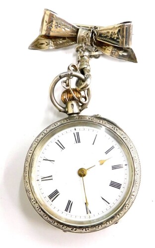 A continental silver fob watch, the small enamel watch head in an embossed silver case, with bow bar attachment, 35g all in.