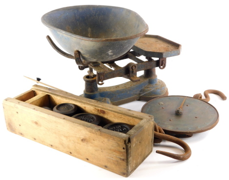 A Salter's brass and iron spring balance, a set of shop scales, and a box of iron weights.