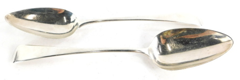 A pair of George III Old English pattern silver serving spoons, London 1805, 4¼oz, 22cm long.