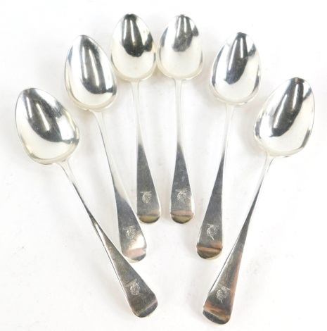 A set of five George III Old English pattern dessert spoons, and a later matched spoon, with unicorn insignia to handle, possibly for London 1809 and 1816, 5¾oz.