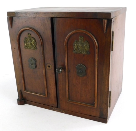 An unusual late early 19th/early 20thC mahogany stationery cabinet, modelled in the form of a safe. (AF)