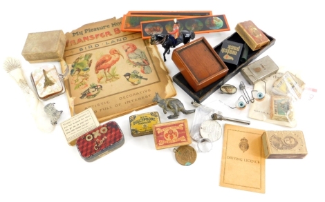 A quantity of collectables, to include a set of Victorian turned bone markers, a silver cheroot case, various matchboxes, gramophone needle cases, mother of pearl Royal Artillery badges.