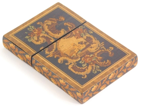 A 19thC Tunbridge ware card case, inlaid with a cartouche to one side and a cube design to the reverse, 11cm x 7.5cm.