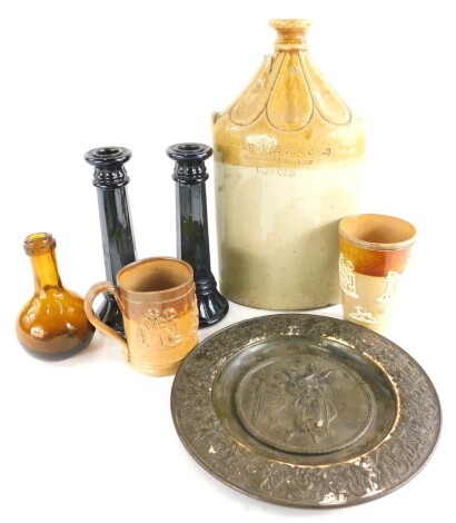 Miscellaneous items, to include a stoneware beaker and mug, a stoneware bottle stamped for H.Howse Veterinary Surgeon Lincoln, a pair of moulded glass candlesticks, and a continental bronze Grand Tour type plaque. (AF)