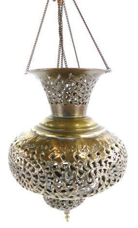 An Eastern pierced brass hall lantern, decorated with leaves, etc.
