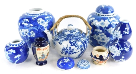 Oriental porcelain, to include a Chinese double gourd shaped blue and white vase, a ginger jar and cover and a ginger jar base, some pieces (AF)