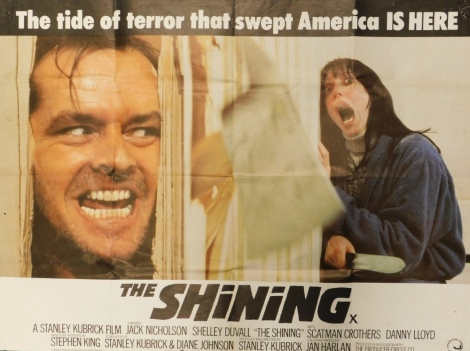 A film poster for the Stanley Kubrick film The Shining, with slogan The Tide of Terror That Swept America Is Here. (AF)