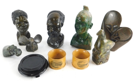 Miscellaneous African souvenirs, to include a carved stone bust, figures, and a pair of Mauchline ware napkin rings, each modelled with scenes from Skegness.