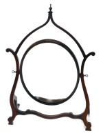 A mahogany dressing table mirror, in Chinese Chippendale style with a shaped frame, oval plate, 78cm high.