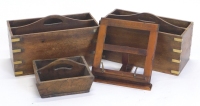 A hardwood table top music stand, with brass brackets, 32cm wide, an elm two division cutlery tray, 26cm wide, and a pair of brass bound magazine racks, 46cm wide.