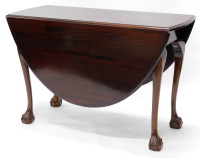 A mahogany and beech drop leaf table, the oval top with a moulded edge, on cabriole legs with ball and claw feet, 112cm wide.