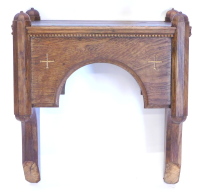 An ecclesiastical oak bracket, with faceted end supports, adapted, 49cm wide.