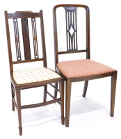 Two Edwardian mahogany and boxwood strung bedroom chairs, each with a padded seat on square tapering legs.