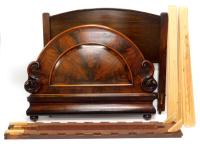 A mahogany bed head and foot, comprising a figured mahogany foot board and later associated headboard, 150cm wide.