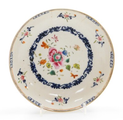 A Chinese porcelain plate, decorated with a central roundel of flowers with a scrolling underglaze blue border, 19thC, 16cm diameter. - 5