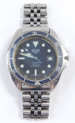 A Heuer gentleman's automatic 200m professional stainless steel case wristwatch, circular black dial, with centre seconds, date aperture, black rotating bezel, back plate engraved Etanche Acier - Automatic 844/3, on a bracelet strap, boxed. - 4