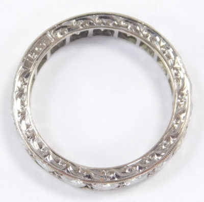 A diamond full eternity ring, set in white metal, stamped 18ct, approx 2.25cts, size P, 5.3g. - 5