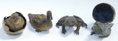 An Austrian early 20thC cold painted bronze figure of a duck, in the manner of Franz Bergman, stamped Geschutz and other indistinct marks, 8cm wide, together with a cold painted bronze figure of a frog, 6cm wide, a cold painted bronze figure of a chick em - 7