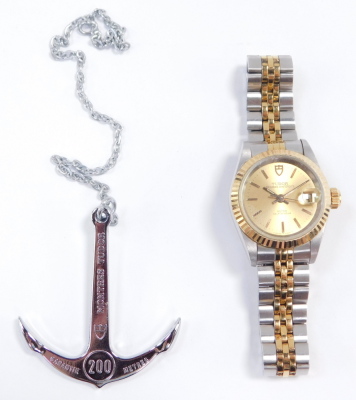 A Tudor Princess Oyster Date lady's bi-colour wristwatch, circular gilt dial with centre seconds, date aperture, rota self winding, on a bracelet strap, with 200 metre guarantee under water anchor pendant on chain, guarantee, booklet and pouch, cased and - 9