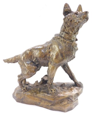 After Thomas Francois Cartier (French, 1879-1943). A bronze metal sculpture of a German Shepherd dog, modeled in standing pose on a naturalistic base, bears signature, 60cm wide.