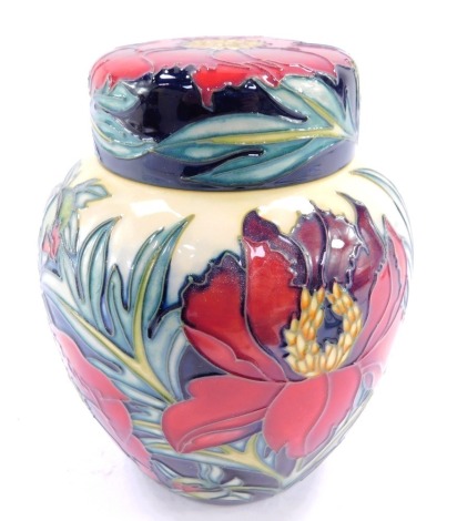 A Moorcroft pottery ginger jar and cover decorated in the Tree Peony pattern, c2004, painted and impressed marks, seconds, 15cm high.