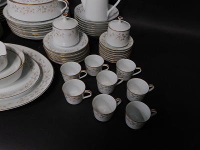 A Noritake porcelain part dinner tea and coffee service decorated in the Estrellita pattern, comprising a pair of graduated meat platters, integrated sauce boat on stand, oval serving dish, vegetable tureen and cover, eight dinner, dessert and side plates - 2