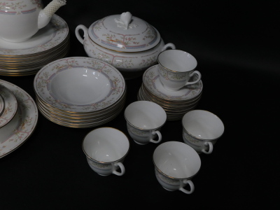 A Royal Worcester porcelain tea and dinner service decorated in the Lagoon pattern, comprising bullet shaped teapot, nine tea cups, seven saucers, ten tea plates, twelve side plates, one oval platter, one oval vegetable dish, nine dinner plates, two circu - 2