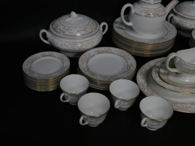 A Royal Worcester porcelain tea and dinner service decorated in the Lagoon pattern, comprising bullet shaped teapot, nine tea cups, seven saucers, ten tea plates, twelve side plates, one oval platter, one oval vegetable dish, nine dinner plates, two circu - 3