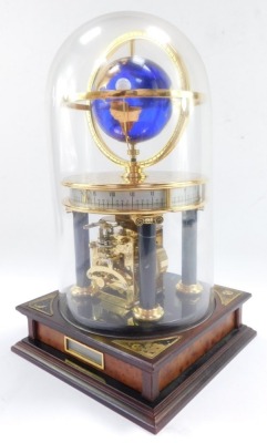 A Chinese brass and marble astrolabium clock, showing the globe and moon, cylindrical twenty four hour dial, raised on Doric columns, above a square mahogany base, with glass dome, 32cm high. - 2