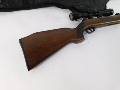 A Westlake .2 calibre air rifle, No 110301115., with a 4x40 gun sight and silencer, cased. - 4