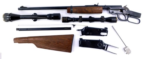 A Daisy Model 1894 .22 air rifle (AF), together with a Nikko Stirling 3 - 9x40 gun sight, and a Tiara 4x28 gun sight. (3)