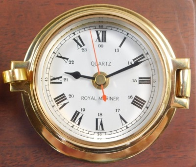 A Royal Mariner brass two dial wall clock and barometer, the clock with quartz movement, the case of porthole form on a wooden backing, 29cm wide., together with a Sewills barometer with thermometer and hygrometer, under a plastic dome, 17cm high. (2) - 6