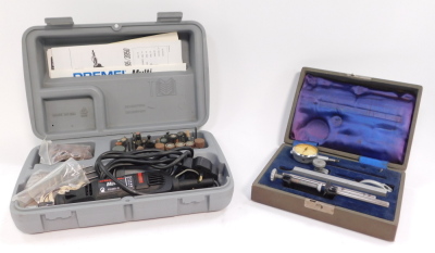 A Dremel multi 395 variable speed rotary tool, boxed with instructions, together with a Capstan No 001 dial test indicator gauge, cased. (2)