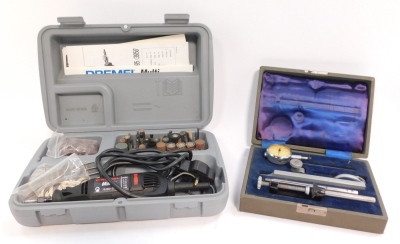 A Dremel multi 395 variable speed rotary tool, boxed with instructions, together with a Capstan No 001 dial test indicator gauge, cased. (2) - 3