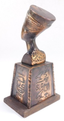 A copper 20thC bust of Queen Nefertiti, raised on a stand embossed with a vulture and hieroglyphs, on a wooden base, 19cm high. - 3