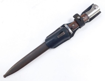 A WWI German saw back bayonet by H Mundlos & Company, Magdeburg., stamped with a crown mark and W16, with scabbard. - 2